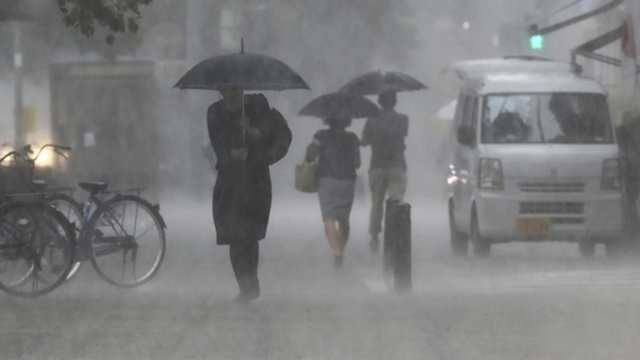 Heavy Rain Batters Southern Japan as Twin Tropical Storms Approach