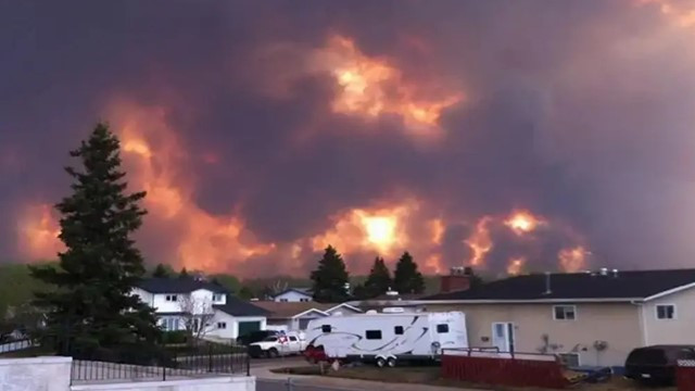 More Than 20,000 Evacuated as Fast-Moving Wildfire Spreads in British Columbia