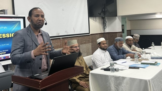 The Chief Guest is speaking at the Education Session. Photo: MUNA