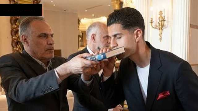 Iranian Football Team Begins World Cup Journey by Kissing Holy Quran