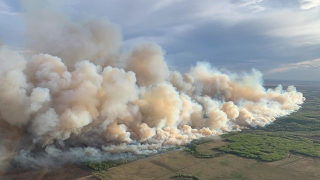 Wildfires Ravage Western U.S. and Canada, Thousands Evacuated